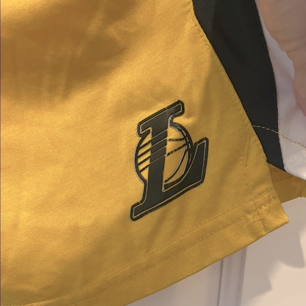 Lakers Yellow Athletic Shorts with Black and White Stripes. Perfect for boys!!
